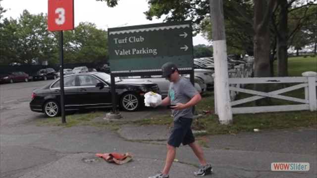 SuffolkDowns2019-0629-ManWalkingEntrance